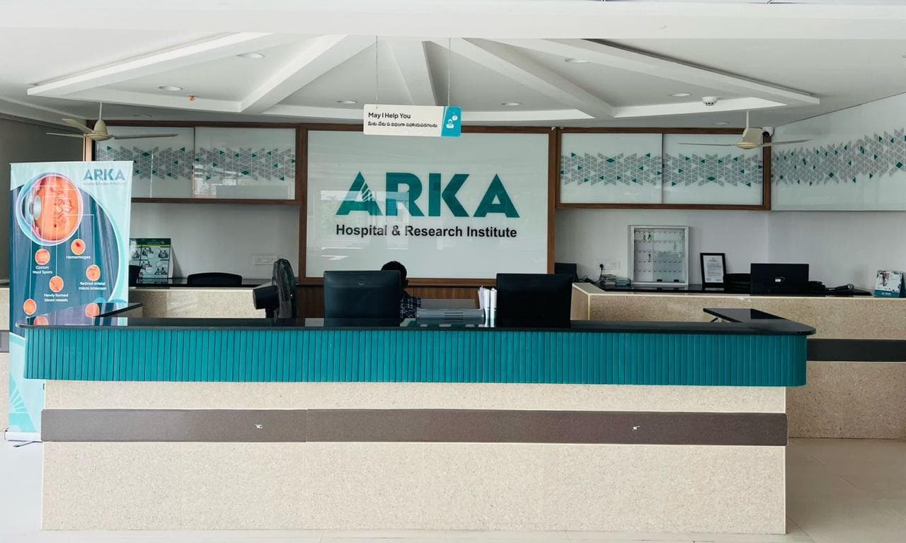 ARKA Hospital reception desk with wood slat walls by V3 Spaces